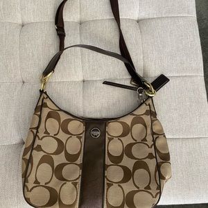 coach brown and tan colored bag